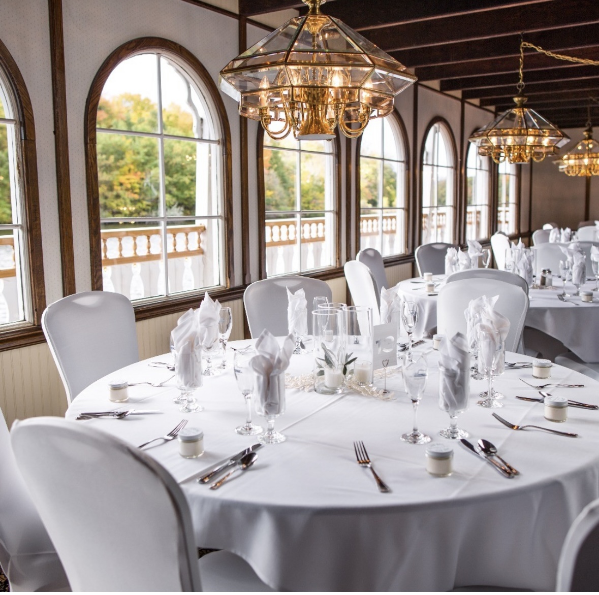 Elegant wedding reception on a boat, with stunning views of the water and a romantic atmosphere