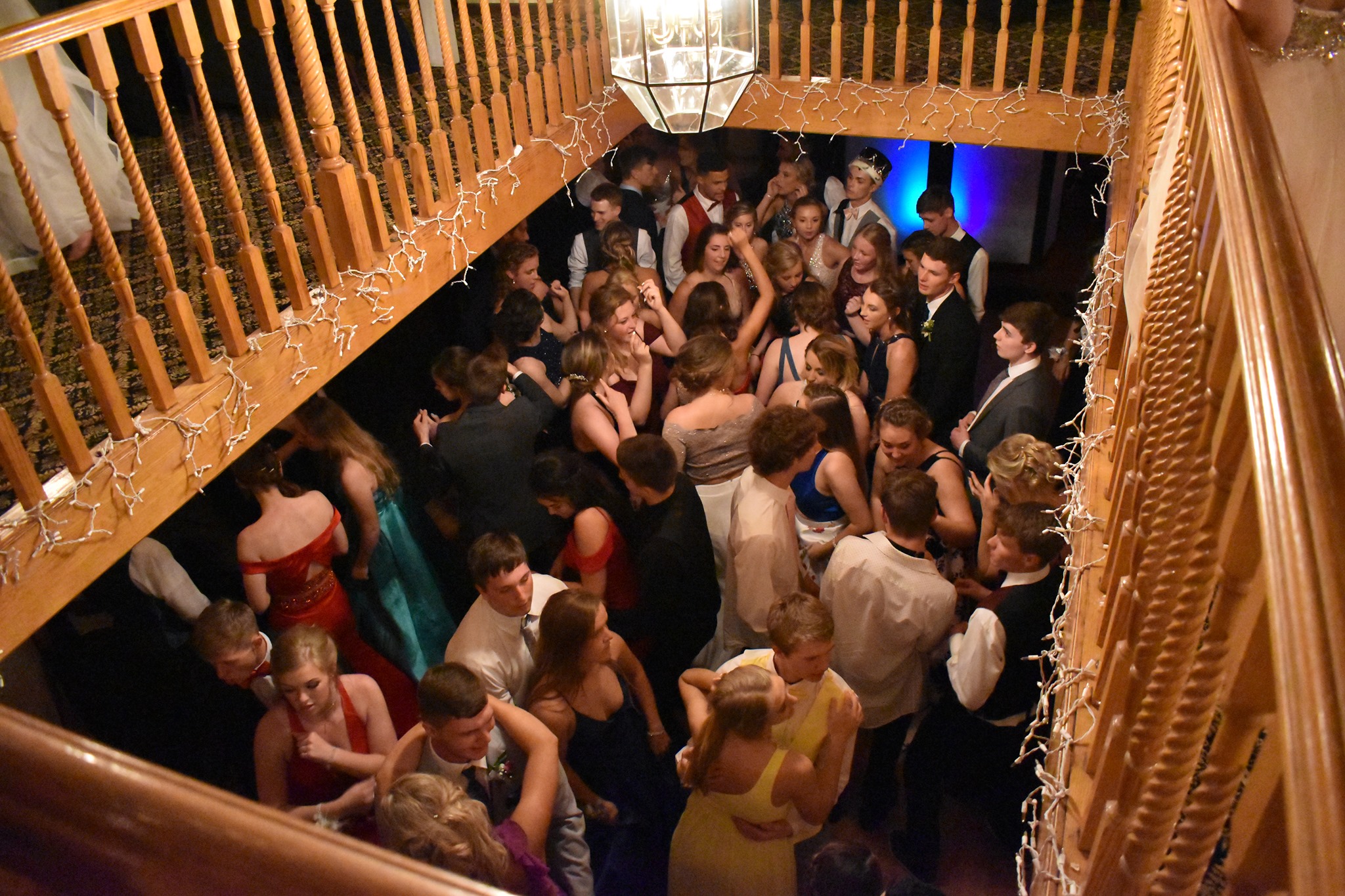 Energetic dance floor on the Michigan Princess Riverboat during a prom event.